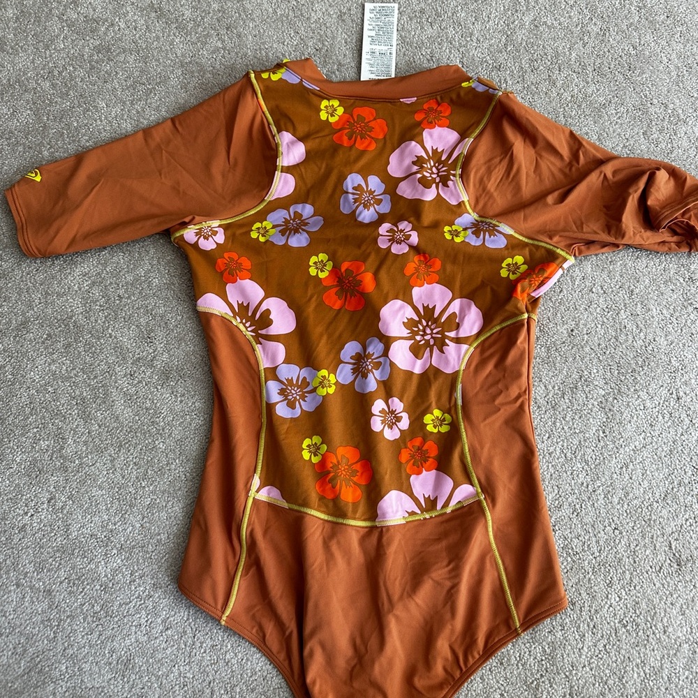 Roxy X Kate Bosworth collection. One piece swimsuit, brand new with tags.